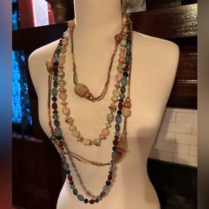 Bundle of three beaded necklaces. Pink, blue long